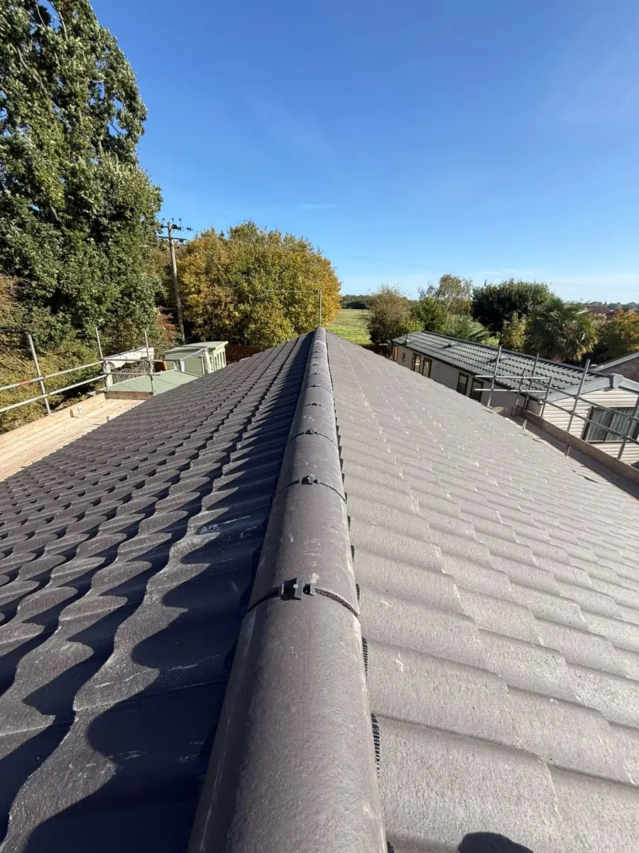 Looking along the new dry ridge of a re-roofed bungalow in Diss