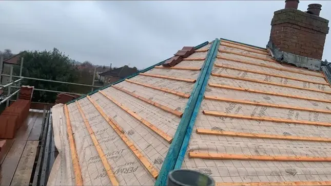 New battens set out over membrane on a Norfolk roof ready for pantiles