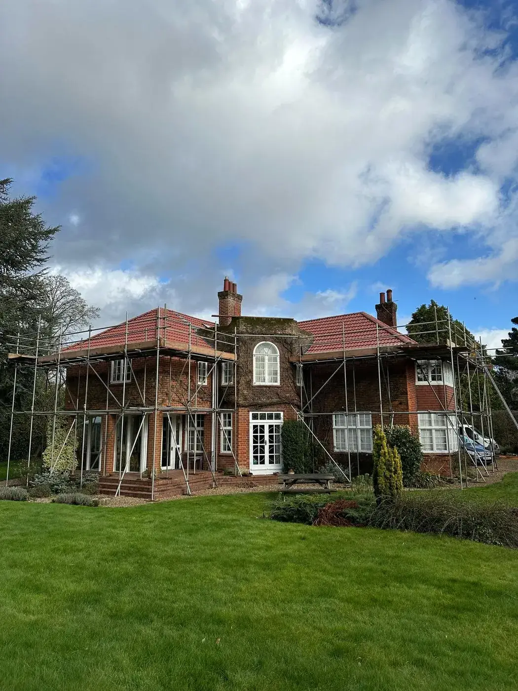 Finished double pan terracotta pantile roof on a detached period house in Norfolk