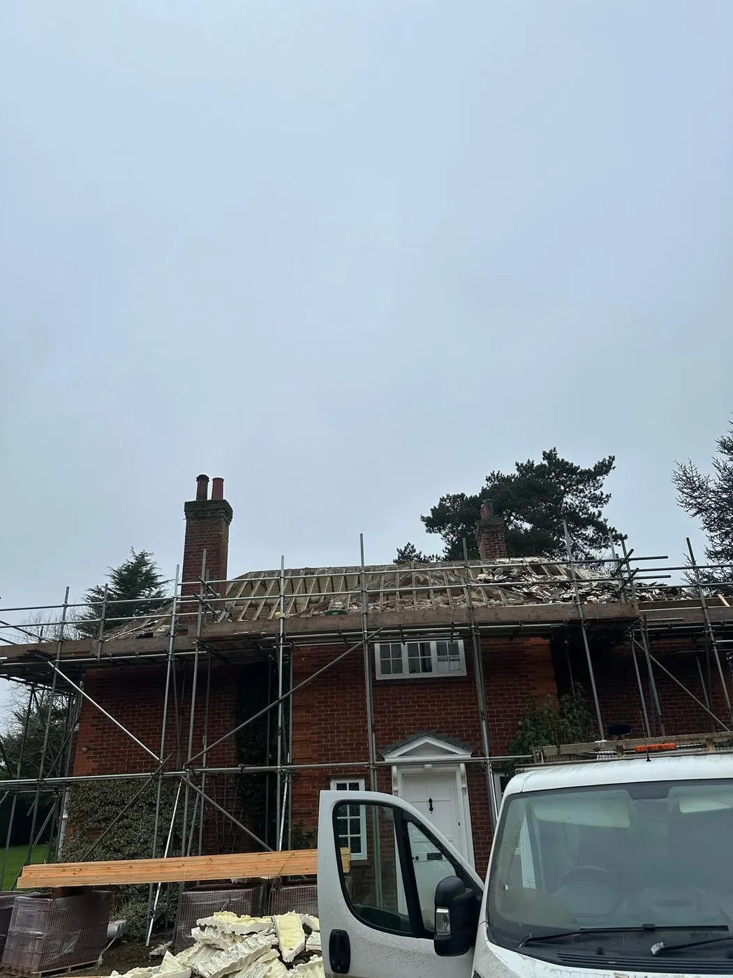 Period house roof stripped back to bare rafters with the spray foam removed